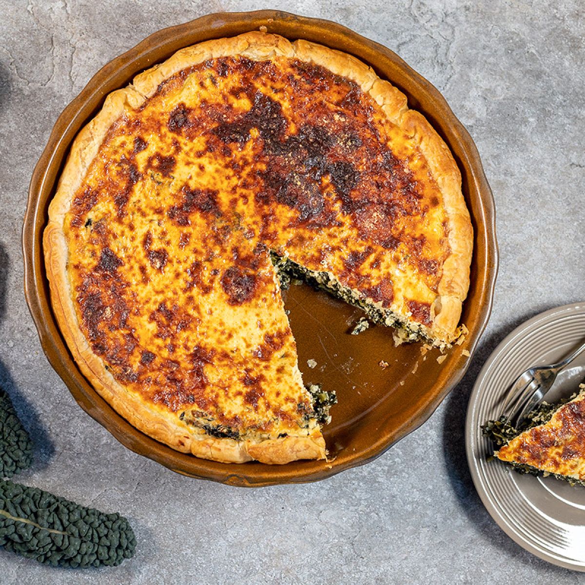 Palmkool quiche met ricotta en Parmezaanse kaas
