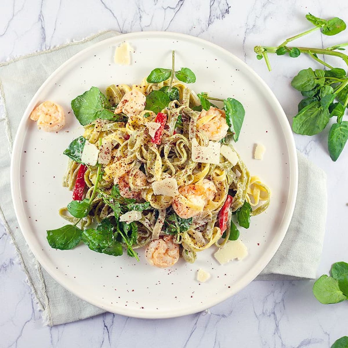 Pasta met waterkers en garnalen