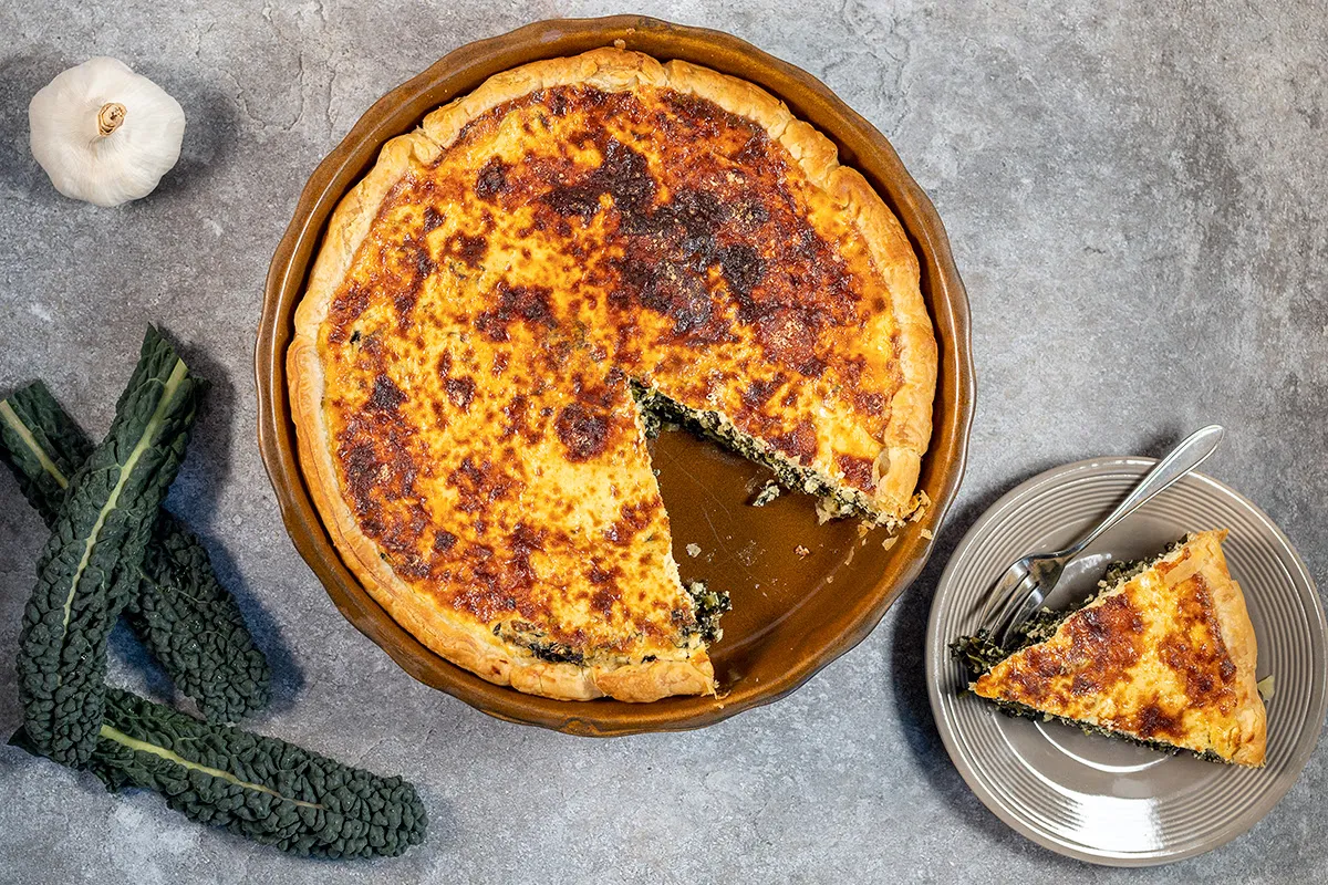 Palmkool quiche met ricotta en Parmezaanse kaas
