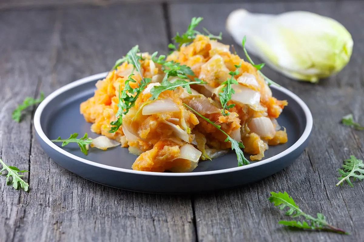 Zoete aardappel stamppot met witlof