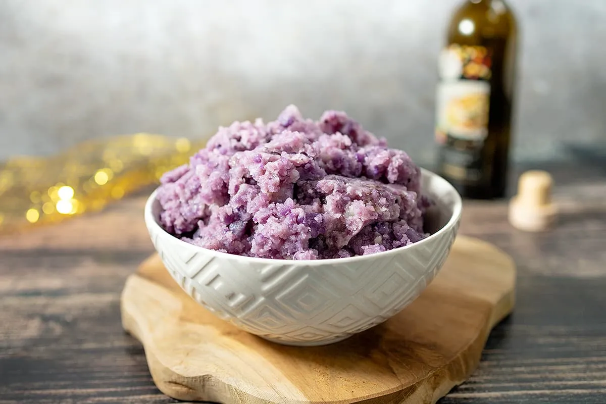 Vitelotte aardappelpuree met truffel en parmezaan