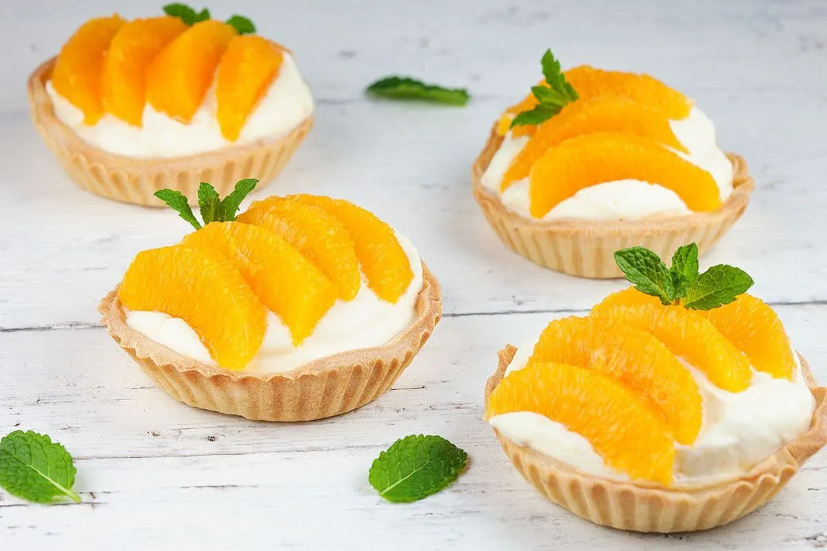 Mini sinaasappeltaartjes - de leukste oranje gebakjes