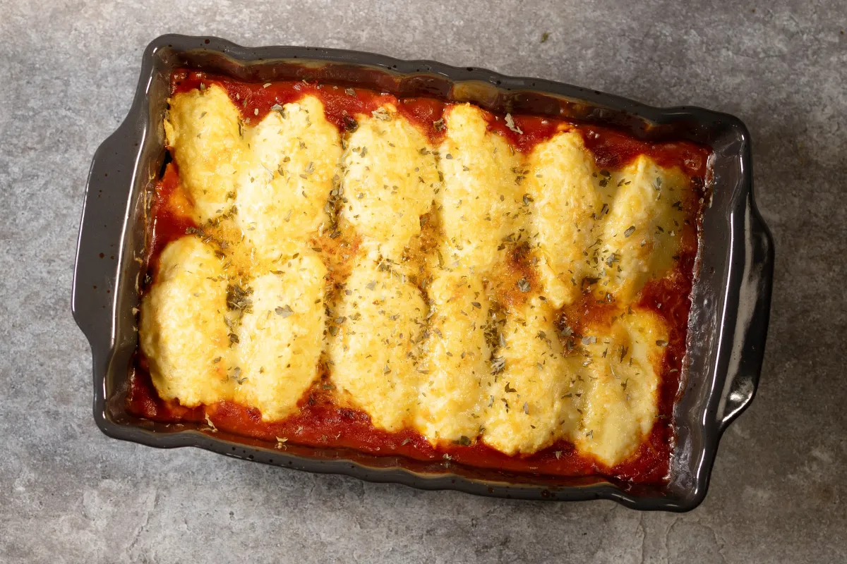 Quenelles met kip en tomatensaus
