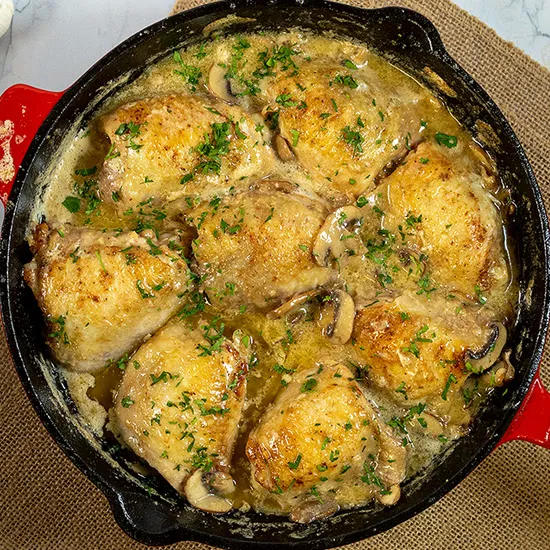 Kippendijen met champignonroomsaus