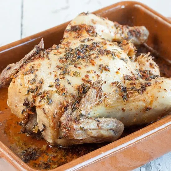Recept: Hele geroosterde kip met knoflook en lavendel