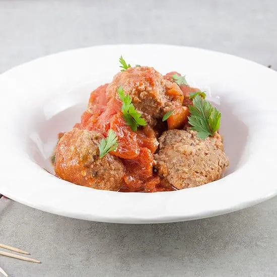 Recept: Spaanse gehaktballetjes in pittige tomatensaus